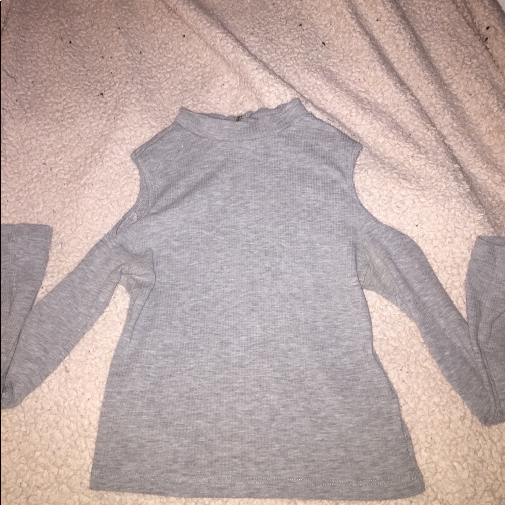 Cut-open shoulder top
